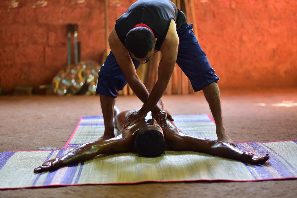 Kalari Massage using feet technique